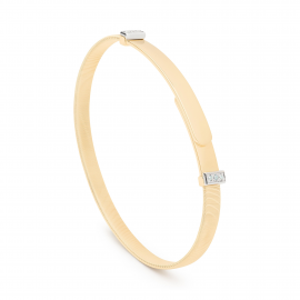 Masai Armreif aus Gelbgold mit Diamantpavé-Station in schmaler Version